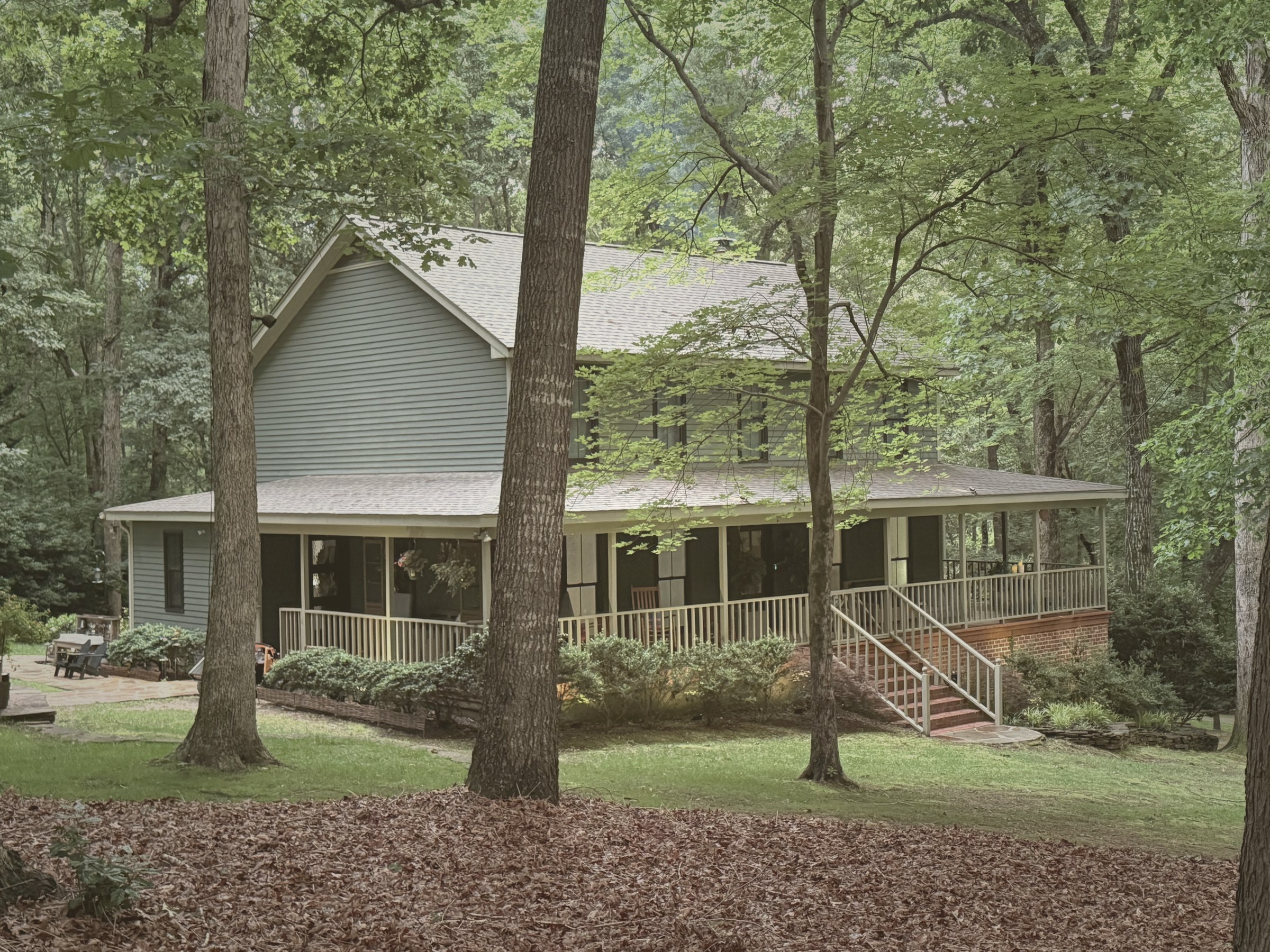 A beautiful home nestled in the trees